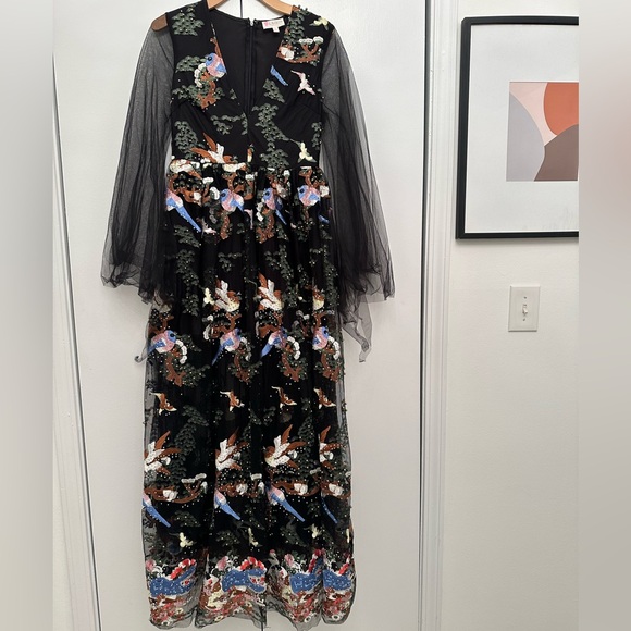 Vibrant beaded dress with a nature scene and she arms - Picture 3 of 11